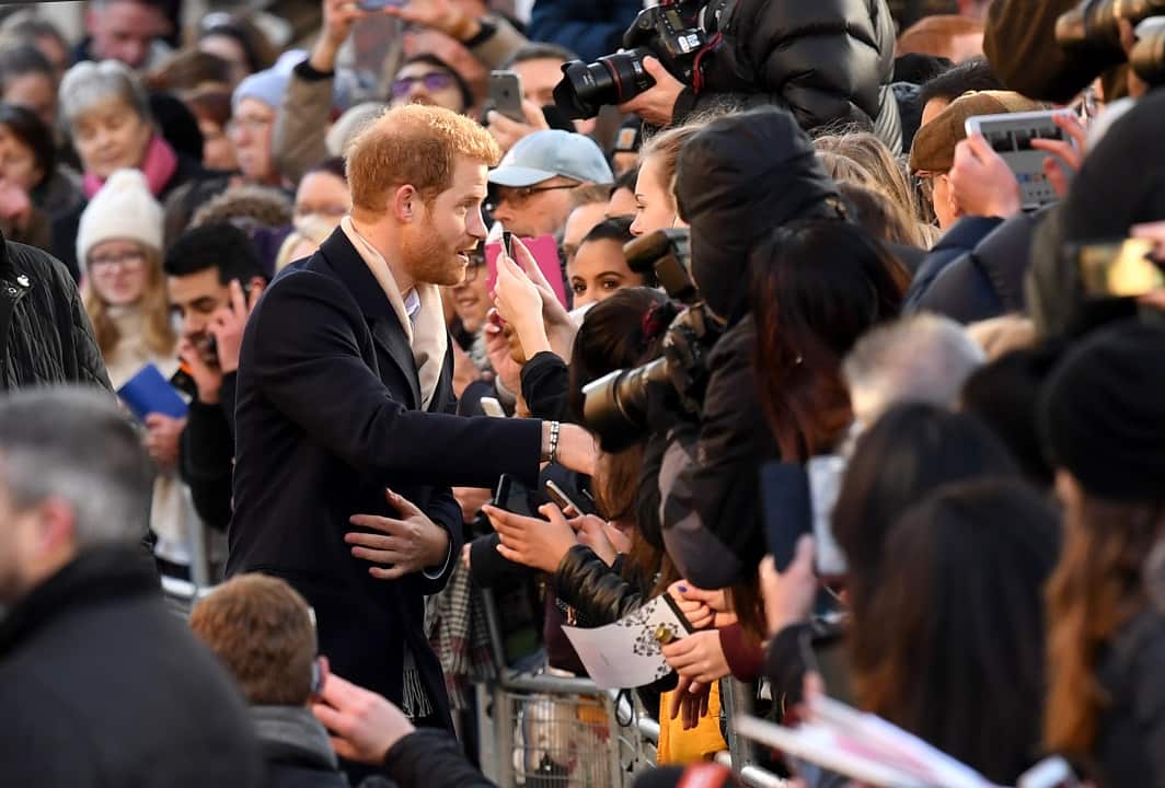 Prince Harry interacts with fans during a Royal visit to Nottingham. Photo credit should read: M6027D/EMPICS Entertainment.