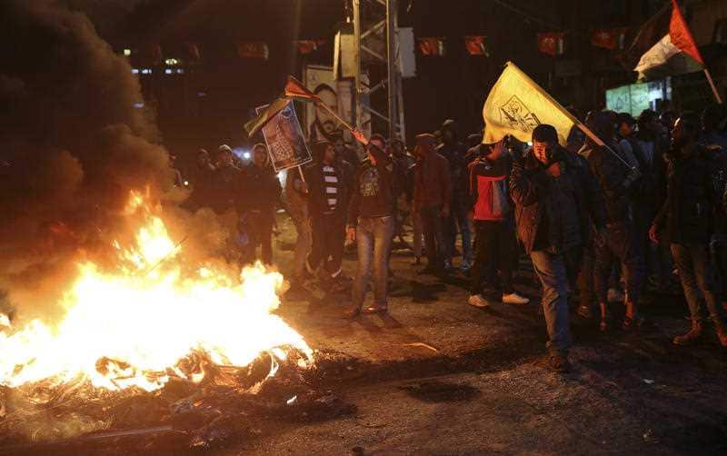 Gaza City Hundreds of angry Palestinians have taken to the streets in the wake of US President Donald Trump's decision to shift recognition of the Israeli capital from Jerusalem to Tel Aviv.