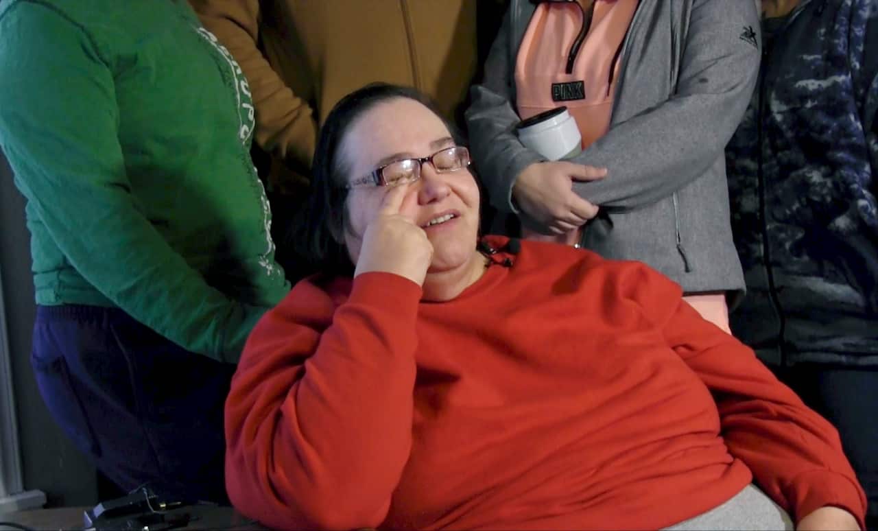 Lisa Finch reacts to the death of her son Andrew Finch after he was shot by police on Thursday.