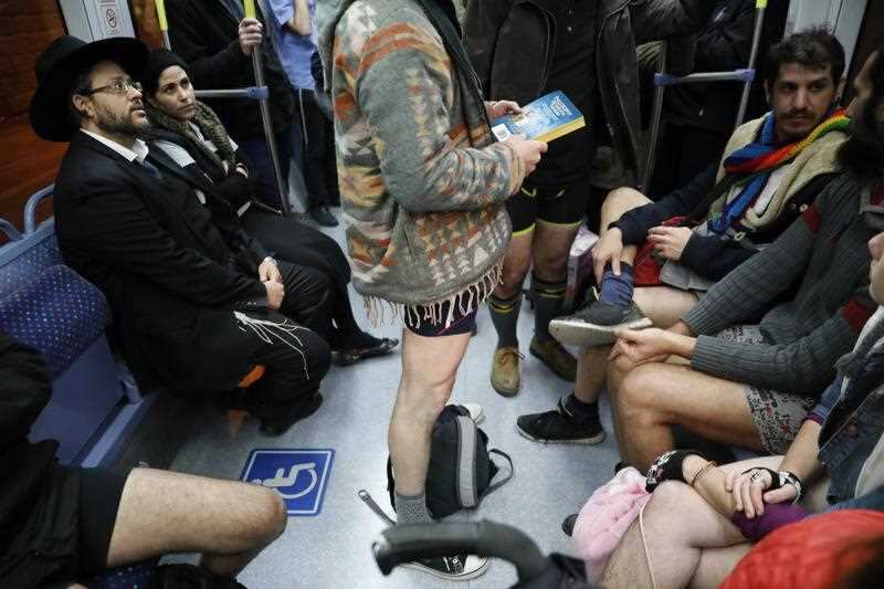 Passengers wear no trousers as they ride the Jerusalem's light train in Jerusalem, Israel, 07 January 2018.