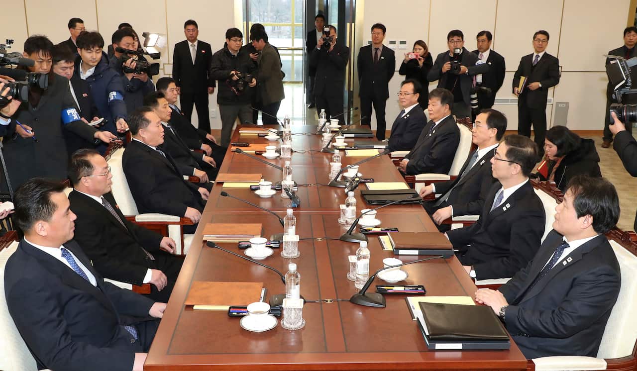 South and North Korean delegations meet at the Panmunjom in the Demilitarized Zone in Paju, South Korea.