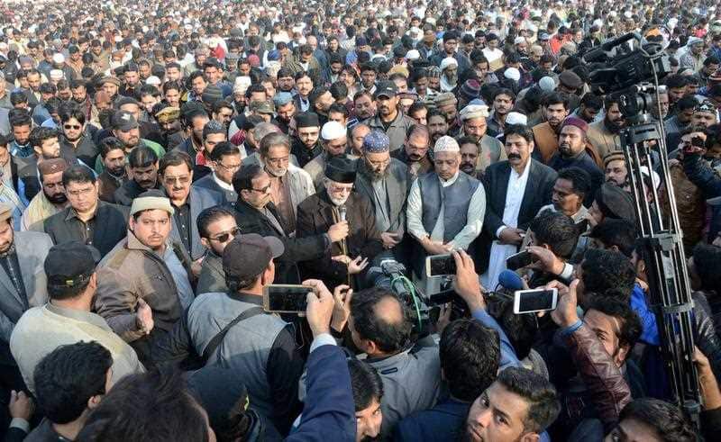 A handout photo made available by Pakistani Awami Tehreek shows Tahirul Qadri (C), a religous scholar leads the funeral prayers of the seven-years-old girl named Zainab, in Kasur, Pakistan, 10 January 2018.