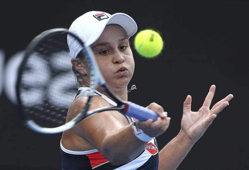 sh Barty of Australia hits a forehand to Angelique Kerber of Germany in their women's final singles match at the Sydney International tennis tournament in Sydney, Saturday, Jan. 13, 2018.