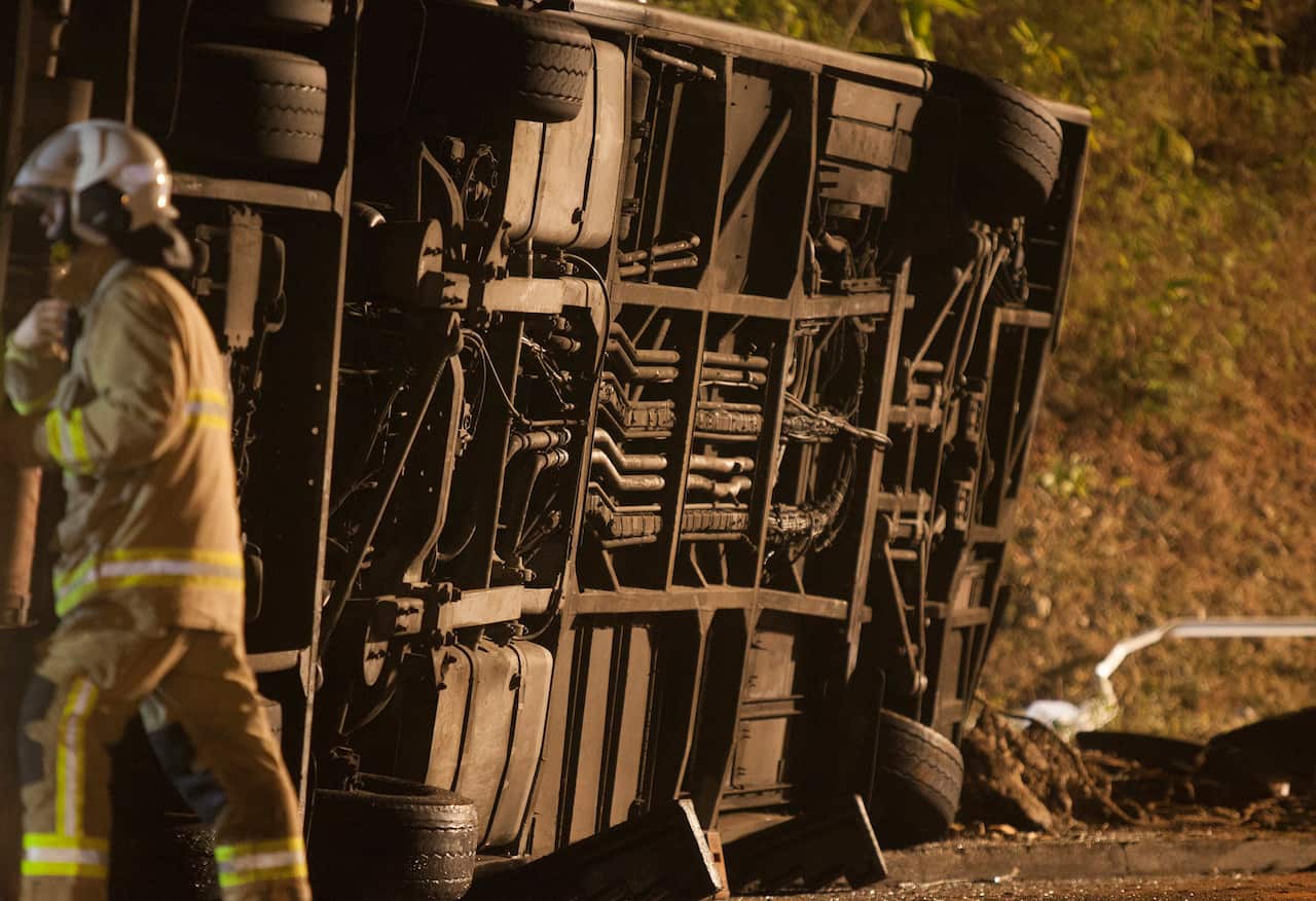 A fireman at the scene of the bus crash in Hong Kong.