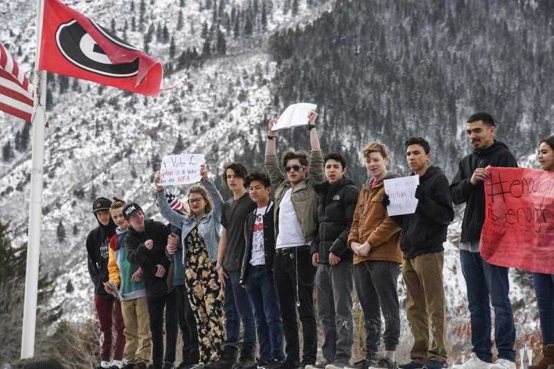 Glenwood Springs High School students take part in a walkout and demonstration during their lunch break in front of the high school in support of the Parkland.