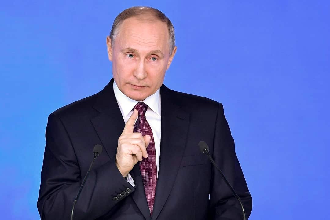 Russian President Vladimir Putin gives his annual state of the nation address in Manezh in Moscow.