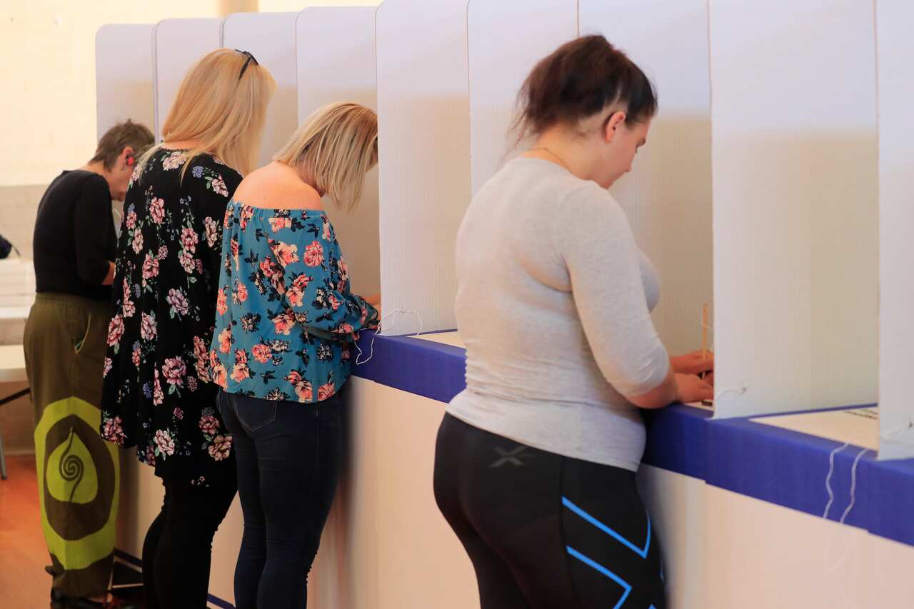 Voters cast their ballots in the Tasmanian State Election at Sorell Memorial Hall, Saturday, March 3, 2018. (AAP Image/Rob Blakers) NO ARCHIVING