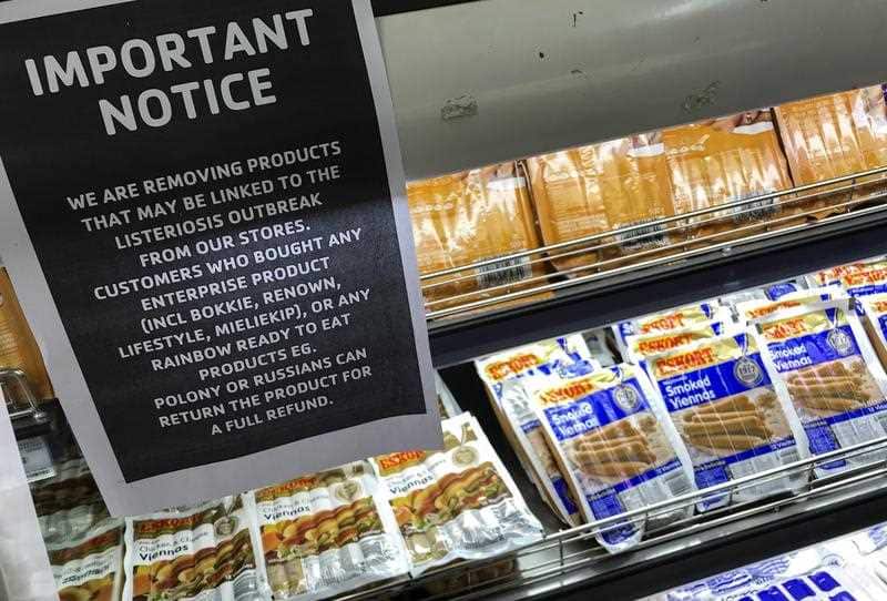 A sign to inform customers is placed over the processed cold meats section of a supermarket in Cape Town, South Africa.