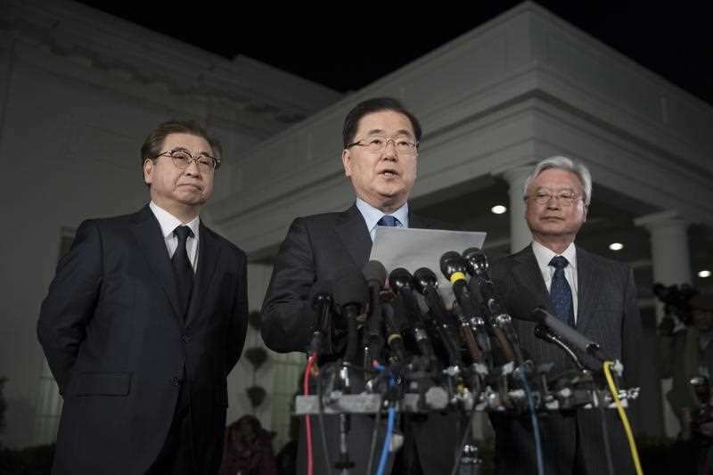 South Korean National Security Director Chung Eui-yong (C) makes a statement regarding his meeting with North Korean leader Kim Jong Un.