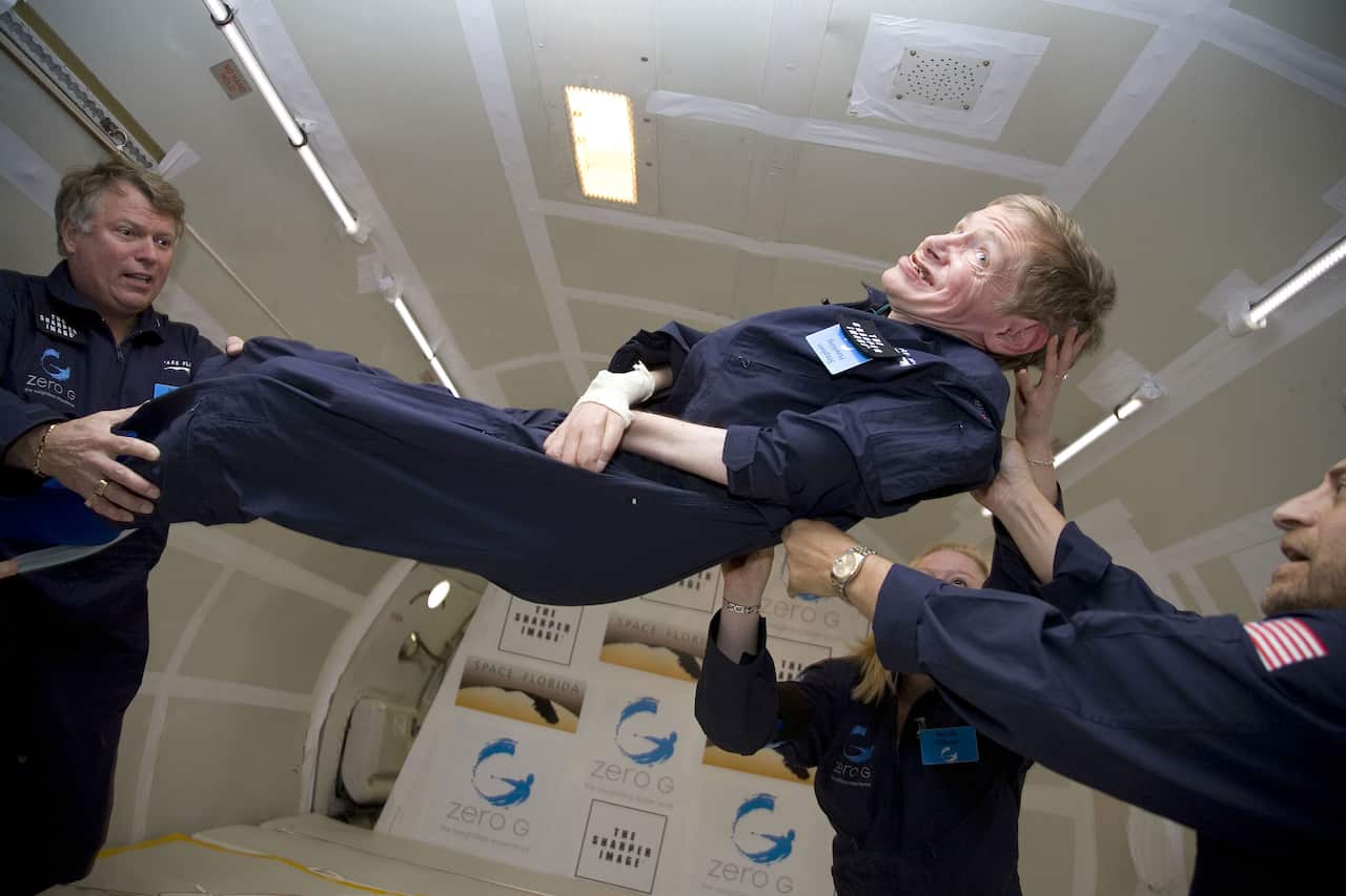 Physicist Stephen Hawking is assisted in experiencing zero-gravity. April 2007 