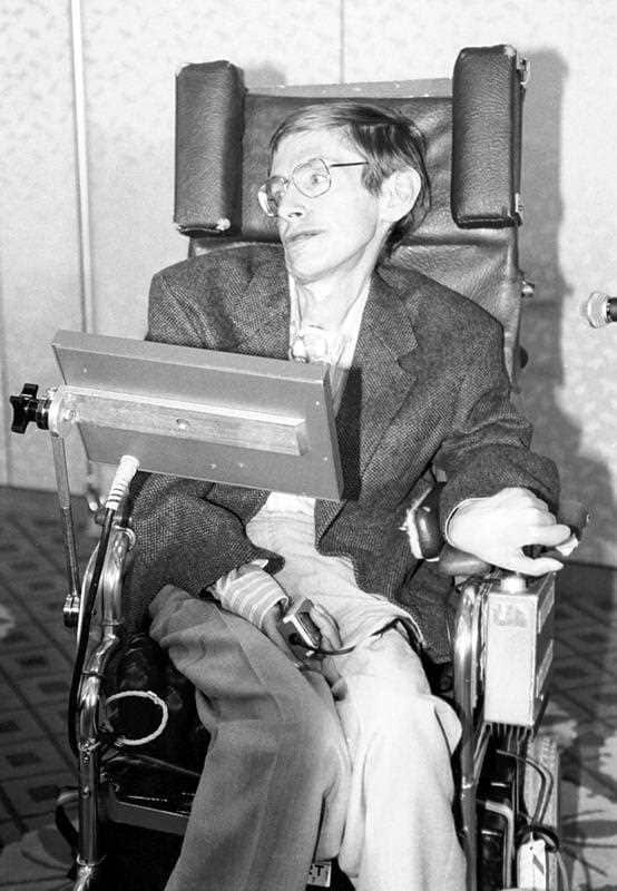 nglish theoretical physicist Stephen Hawking attending a press conference in Tokyo in 1991.