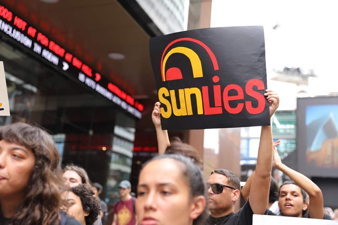 Protestors rally outside Channel 7 studios on March 15.