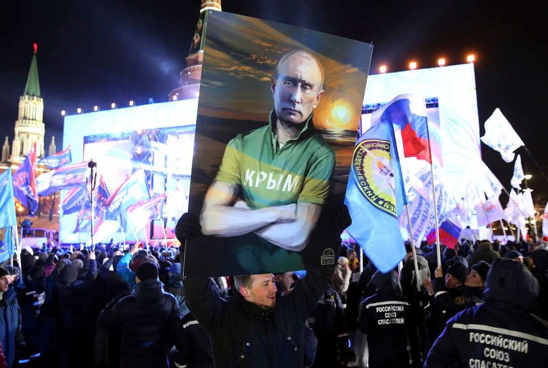 Supporters gather in a rally of Russias President Vladimir Putin in Moscow.