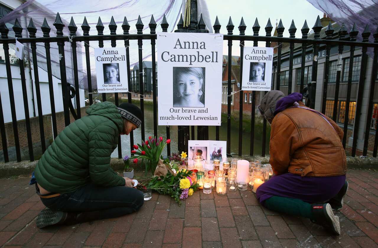 People attend a vigil honouring Anna Campbell in her home town of Lewes, East Sussex.