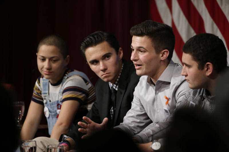 Marjory Stoneman Douglas High School students, and mass shooting survivors, from the left, Emma Gonzalez, David Hogg, Cameron Kasky, and Alex Wind, participate in a panel discussion about guns, Tuesday, March 20, 2018.