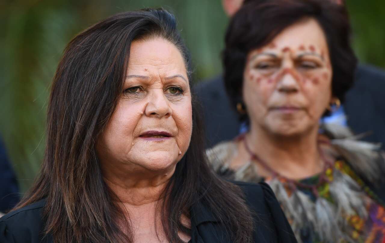Jill Gallagher, AO, Victorian Treaty Advancement Commissioner (left) addresses the media outside parliament in Melbourne.