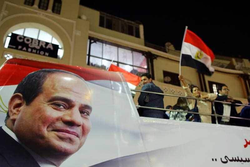  Supporters of Egyptian President Abdel Fattah al-Sisi celebrate in Heliopolis after the presidential election results were announced.
