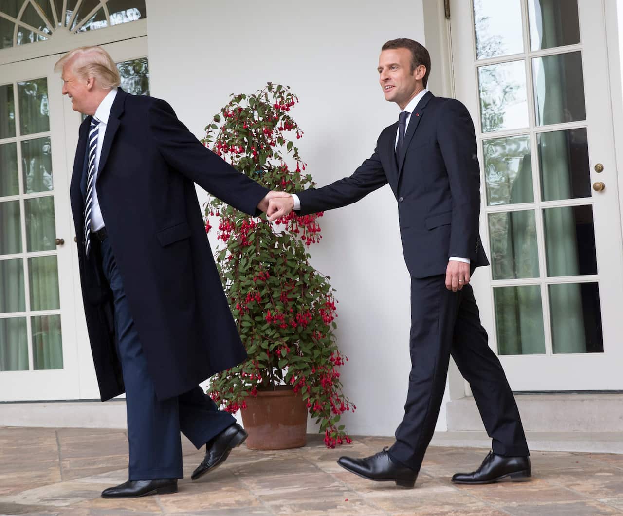 United States President Donald J. Trump leads President Emmanuel Macron of France to the Oval Office 