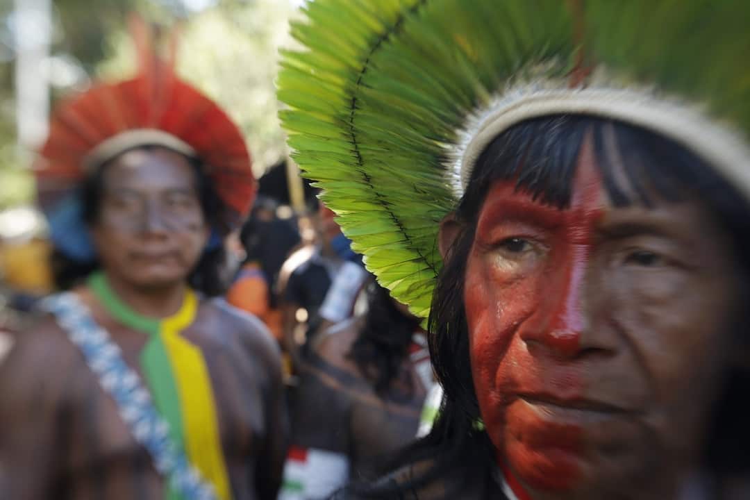 A member of an unspecified Brazilian indigenous tribe pictured in the Terra Livre (Free Land) protest camp in Brasilia