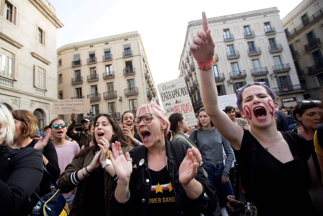 Thousands of people attend a protest against the judiciary sentencing on the trial of five men accused of gang raping an 18-year-old during San Fermin fiestas.
