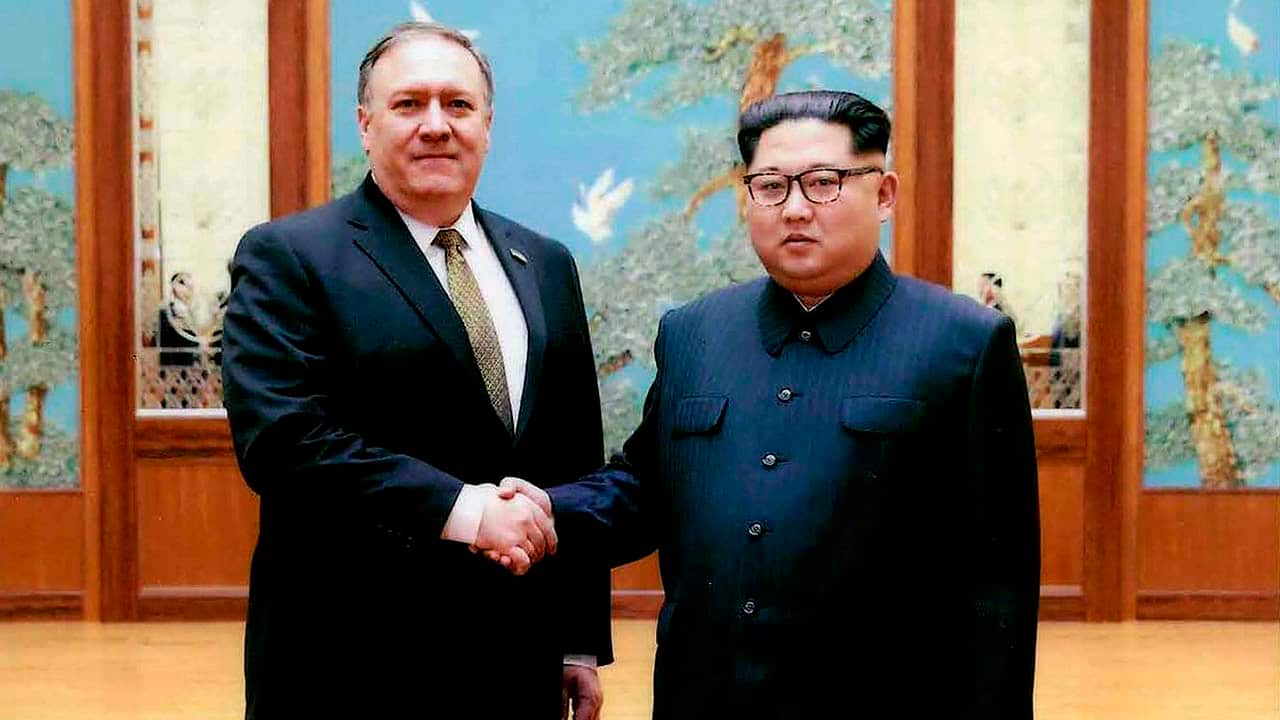 Mike Pompeo (pictured left) with North Korean leader Kim Jon-un (pictured right).