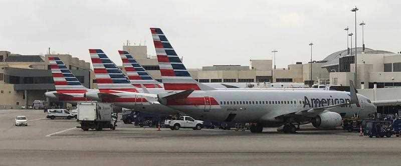 American Airlines planes parked along Terminal Four at Los Angeles International Airport (LAX) in Los Angeles, California, USA, 30 April 2018.