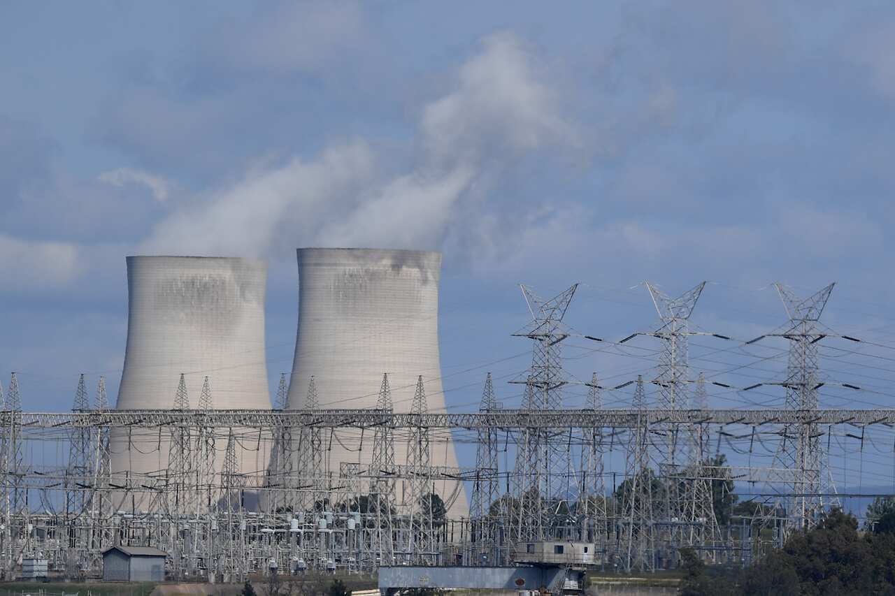 A general view of the Bayswater coal-fired power station cooling towers and electricity distribution wires in Muswellbrook, in the NSW Hunter Valley region.