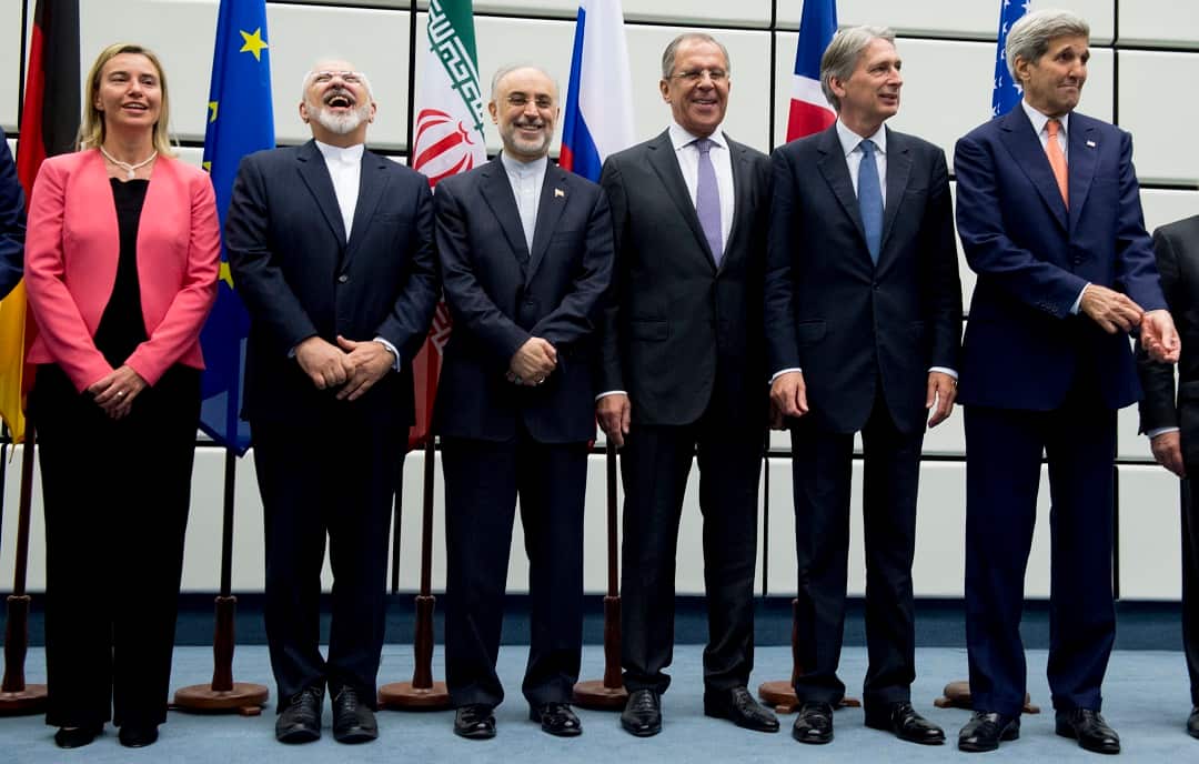 Delegate celebrate the Iran deal in Vienna in 2015.