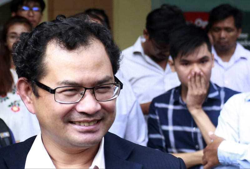 Kay Kimsong, editor-in-chief of the Phnom Penh Post, speaks to reporters after being fired by the newspaper's new owner for a report it published Monday.