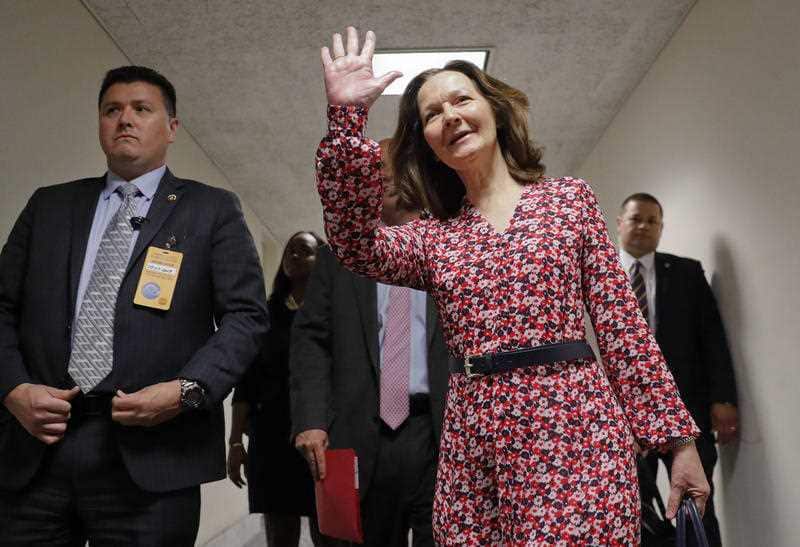 CIA Director nominee Gina Haspel waves as she arrives at Capitol Hill in Washington, Monday, May 7, 2018.