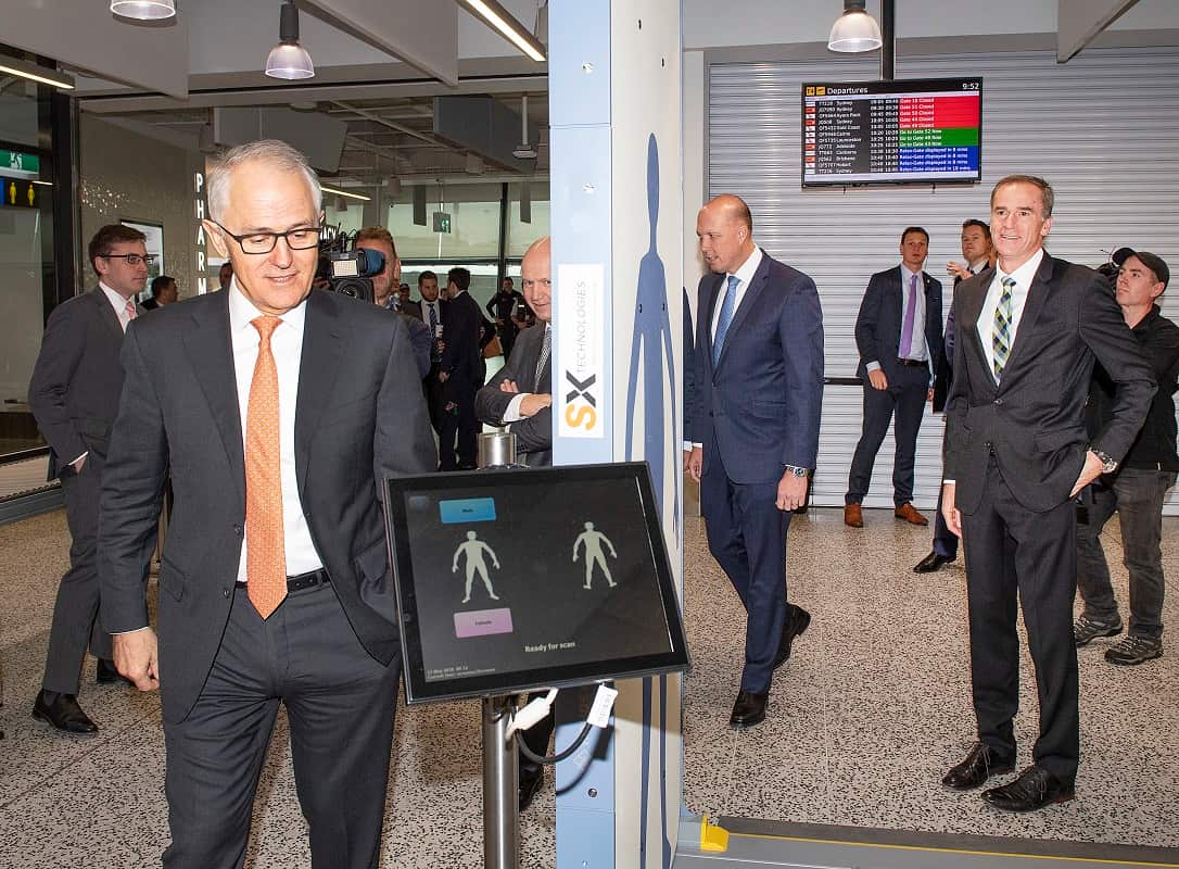 Australian Prime Minister Malcolm Turnbull and the Minister for Home Affairs Peter Dutton MP, are seen inspecting a body scanner during an airport security announcement, at Tullamarine Airport