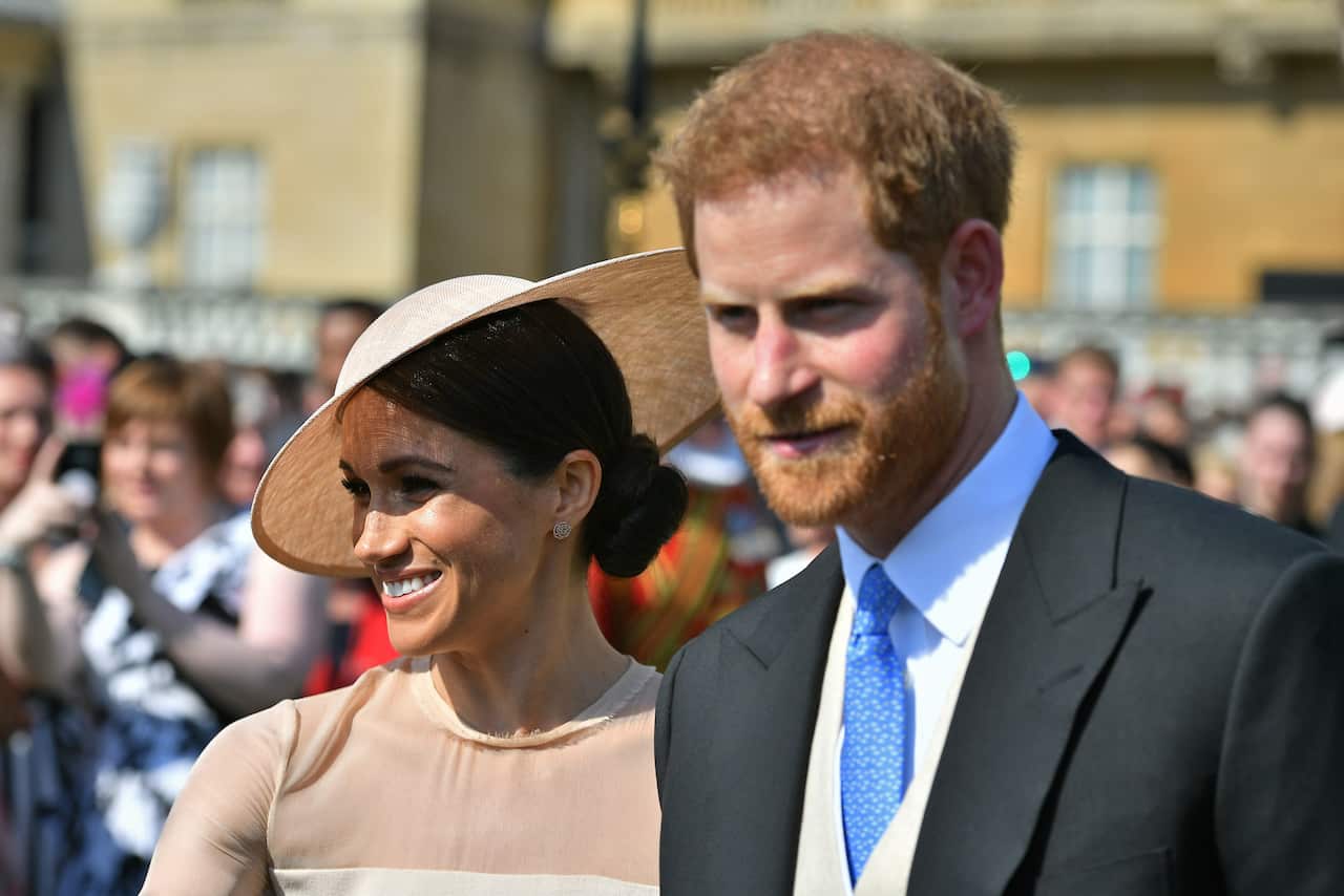 The Duke and Duchess of Sussex at a garden party at Buckingham Palace in London