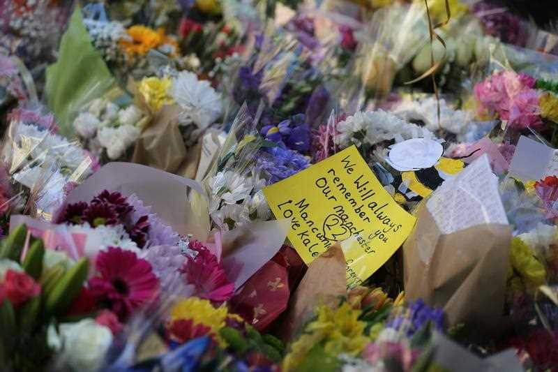 Flowers left by people as they pay their respects in St Annes Square on the 1st anniversary of the Manchester Arena bombing, in Manchester, Britain, 22 May 2018. 