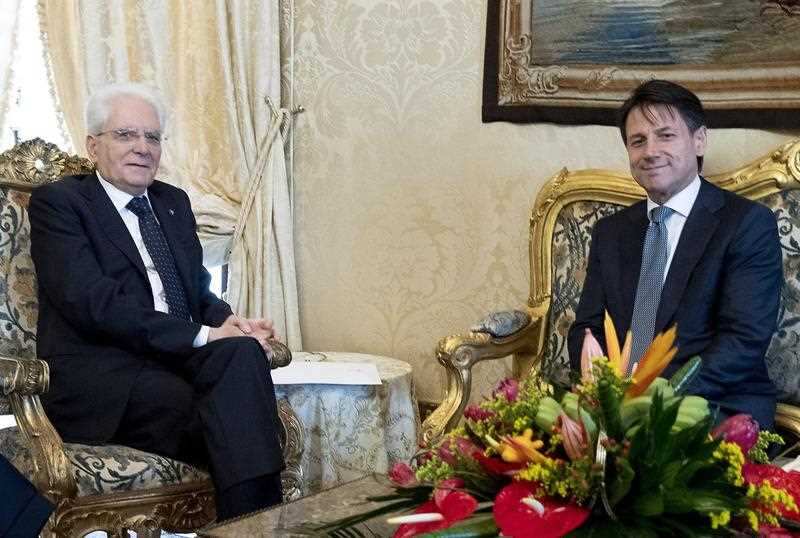 A handout photo made available by the Quirinal Press Office shows Giuseppe Conte (R) meeting with President Sergio Mattarella at the Quirinal Palace in Rome, Italy, 23 May 2018.
