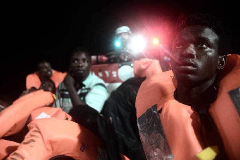 Migrants about to board SOS Mediterranee's Aquarius ship in the Mediterranean Sea. 