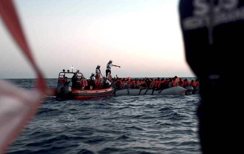 A handout photo made available by SOS Mediterranee shows the sea rescue of a total of 629 migrants.