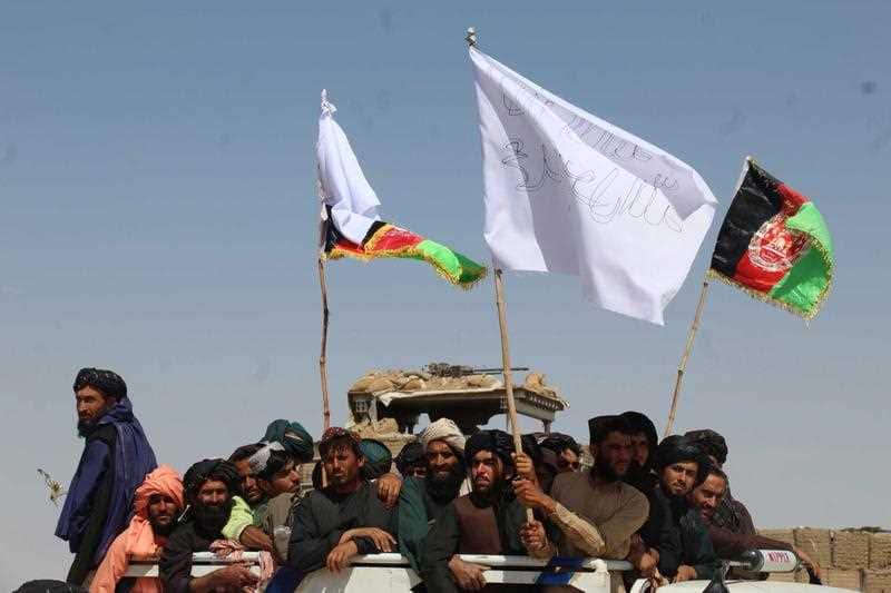 A group of Taliban militants visit the government-controlled areas during the ceasfire