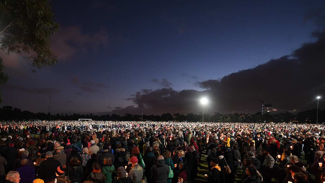 Crowds gather at the Relcaim Princess Park Vigil in Melbourne.