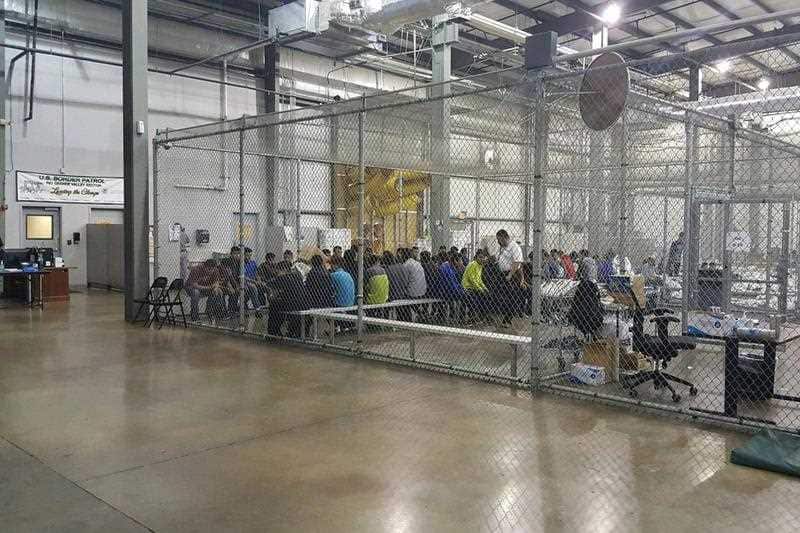 people inside a United States Border Patrol Processing Center in McAllen, Texas,