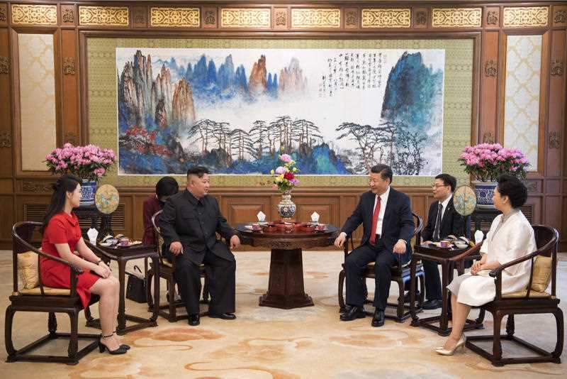 Chinese President Xi Jingping and North Korean leader Kim Jong-un with their respective wives