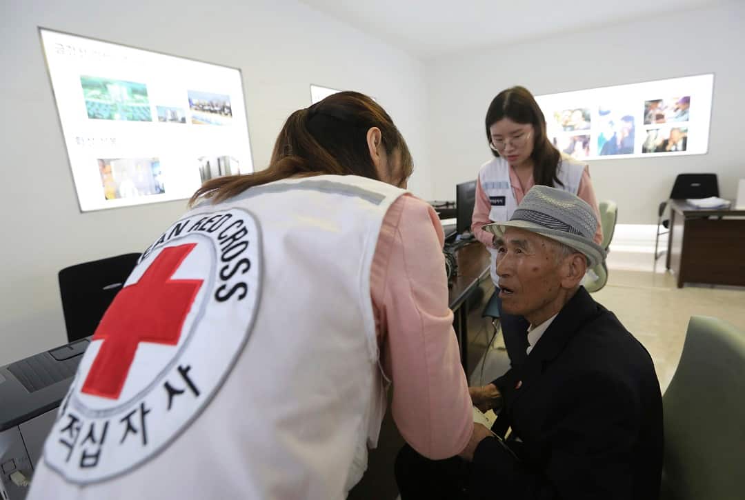 South Korean Yoo Gi-jin, 93, fills out application forms to reunite with his family members who are living in North Korea.