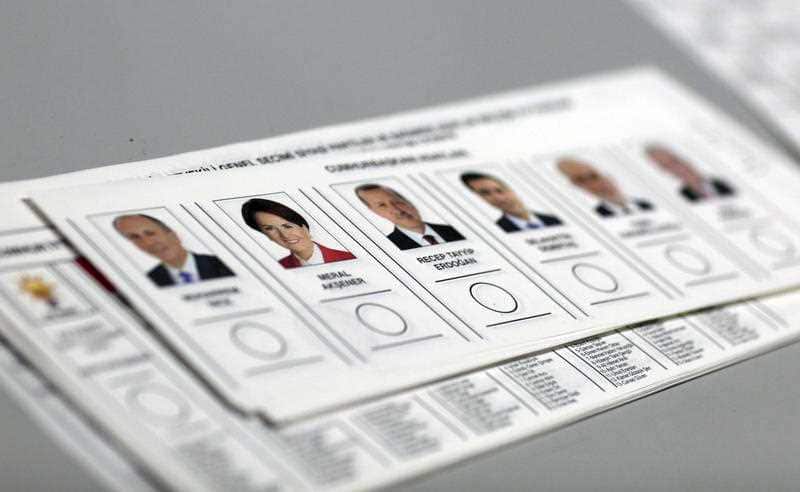 Ballot papers with images of presidential candidates before votes were counted at a polling station in Ankara, Turkey, Sunday, June 24, 2018. 