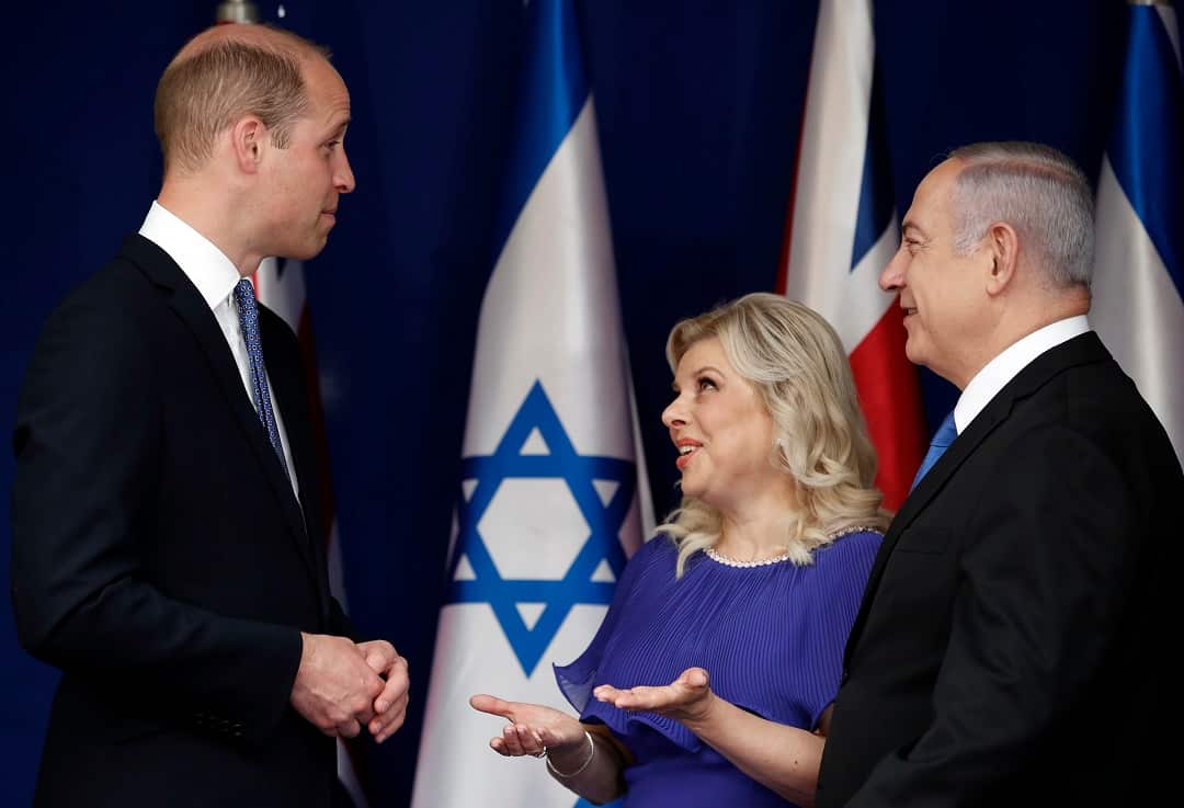Prince William meets with Israeli Prime Minister Benjamin Netanyahu and his wife Sara.