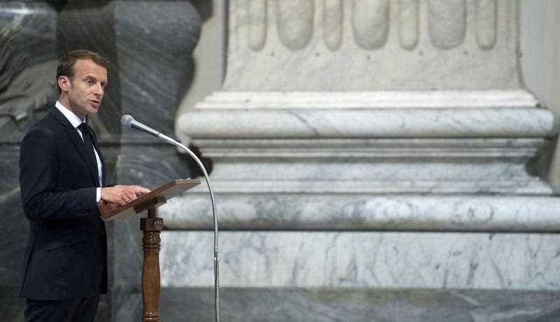 French President Emmanuel Macron speaks after meeting Pope Francis at the Vatican