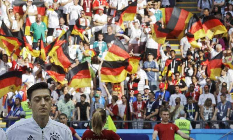 Germany's Mesut Ozil listens to the national anthem prior to the group F match between South Korea and Germany, at the 2018 World Cup.