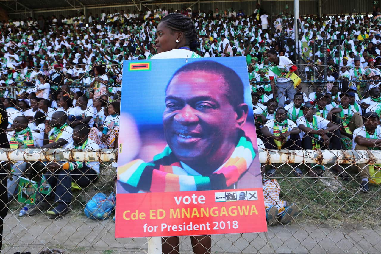 Supporters of Zimbabwean President Emmerson Mnangagwa