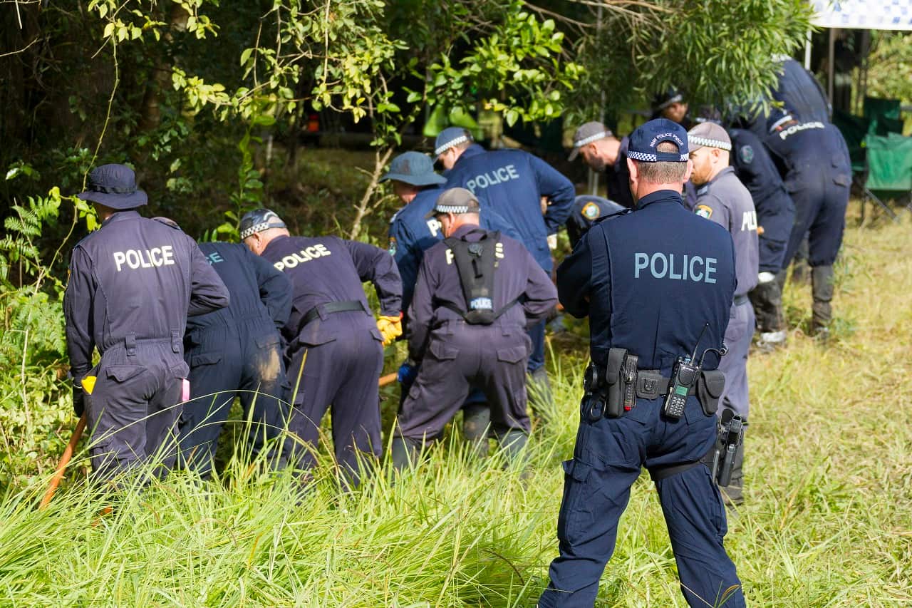 Police hunt for any sign of the missing boy.