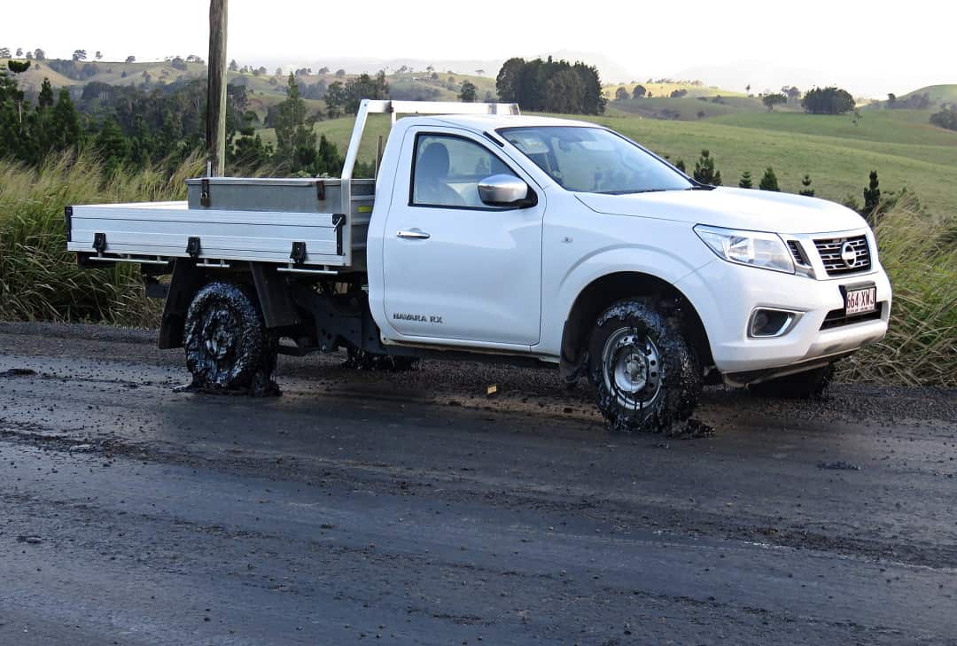 A ute with damaged tires. 