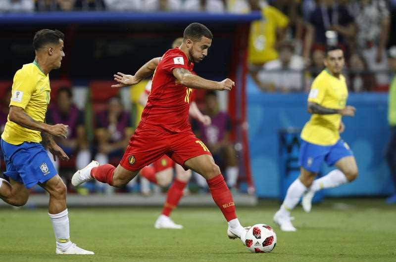Belgium's Eden Hazard goes with the ball during the quarterfinal match between Brazil and Belgium at the 2018 soccer World Cup in the Kazan Arena, in Kazan, Russia, Friday, July 6, 2018.