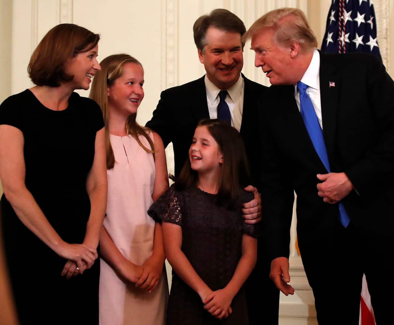 President Donald Trump speaks with Brett Kavanaugh and family.